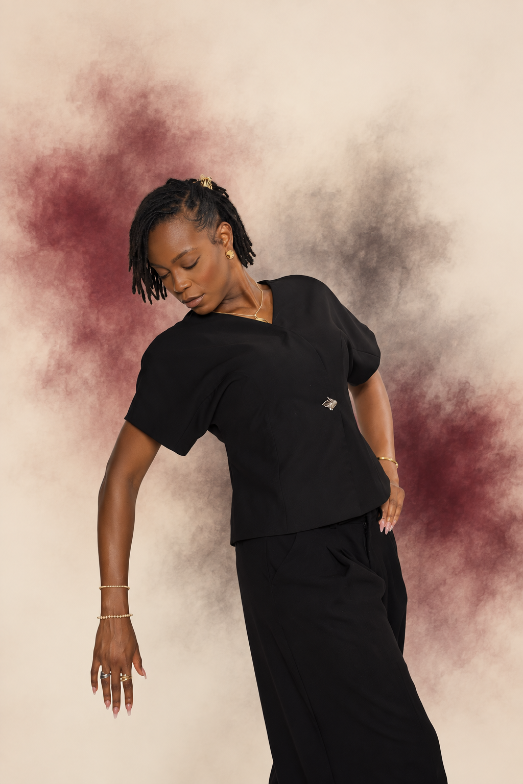 Sandie in architectural black tailoring